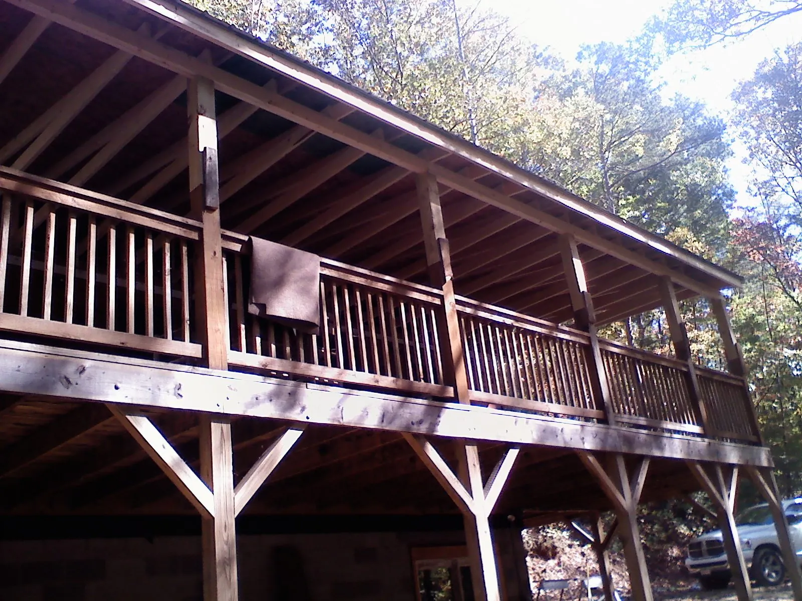Timber framing under a new elevated porch and deck — Roof Leak Repair in Meade by Roofing Brothers
